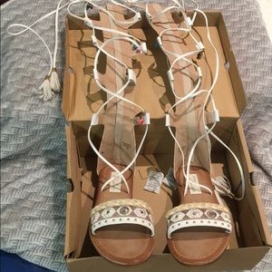 Size 8.5 Gladiators- wrapped lace up sandals.